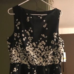 Little black floral dress that has pockets
